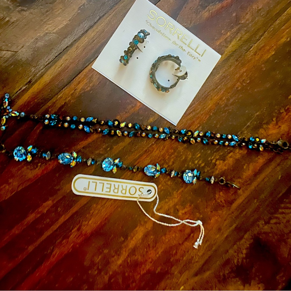 SORRELLI SET INCLUDES EARRINGS, BRACELET AND A CROSS NECKLACE. Listing is FIRM